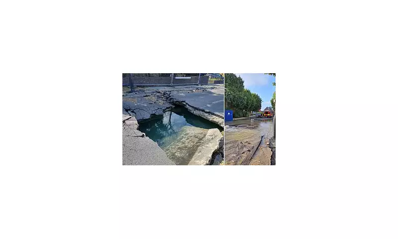 Giant Sinkhole Swallows Clapham Street After Water Main Burst – Chaos Ensues