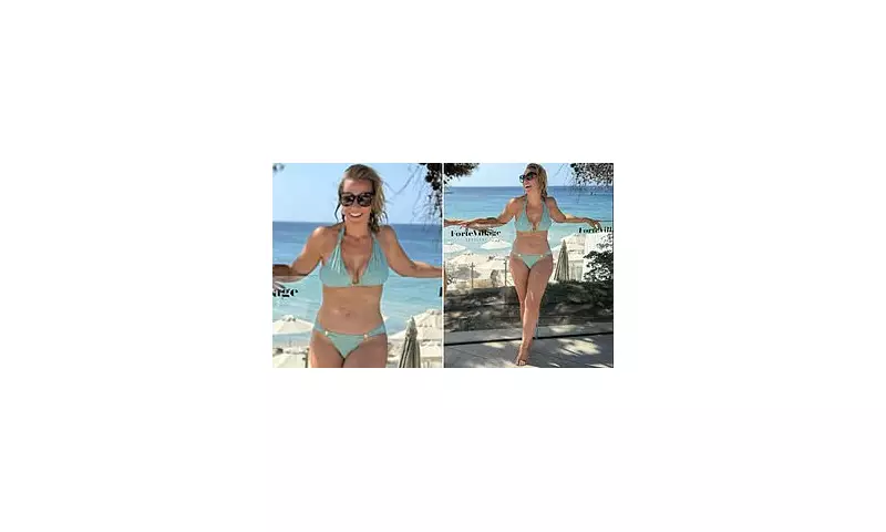 Laura Hamilton Stuns in Blue Bikini During Family Getaway to Sardinia