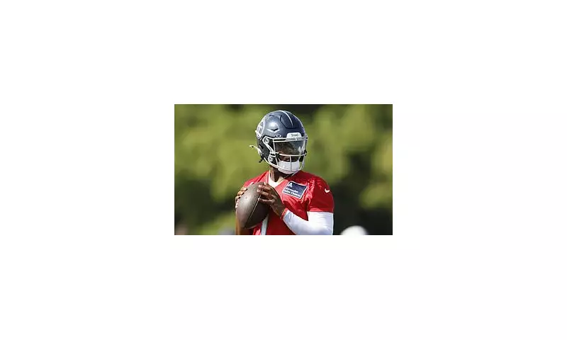 NFL Quarterback Faces Rocky Start in Training Camp Amid Team Tensions