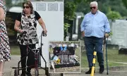 Amy Winehouse's Parents Mitch and Janis Visit Her Grave on 14th Anniversary of Her Tragic Death