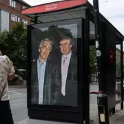 Climate Activists Cover UK Government Buildings in 'Embarrassing' Posters Ahead of COP28