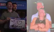 Darts Fans Steal the Show with Romantic Kiss Cam Moment During Coldplay's Performance