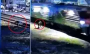 Dramatic Rescue: Man Pulled from Train Tracks Seconds Before Oncoming Train
