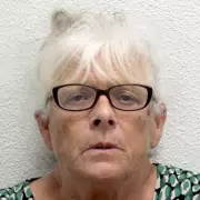 Gangster Granny Caught on CCTV Using Walking Frame to Smash Shop Window in Brazen Raid