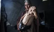 Heartbreaking Image Reveals Gaza's Famine Crisis: Starving Child Wrapped in Plastic as Mother Pleads for Help