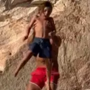 Influencer Dad Sparks Outrage After Tossing Screaming Son Off Stage During Live Stream