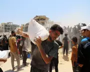 Israel Accused of Starvation Tactics in Gaza: Humanitarian Groups Demand Action