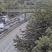 M60 Chaos: Oasis Warehouse Crash Causes Major Delays - Live Updates