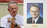 Mark Latham Sparks Outrage with Vulgar Gesture in Parliament Portrait