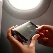 Shocking Discovery: Passenger Finds Forgotten Phone Taped Under Plane Seat