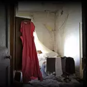 The Haunting Mystery of the Abandoned Red Dress Manor: A Ghostly Tale Unearthed