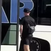 Tommy Robinson Spotted Boarding Flight Amid Legal Controversy – What’s Next?