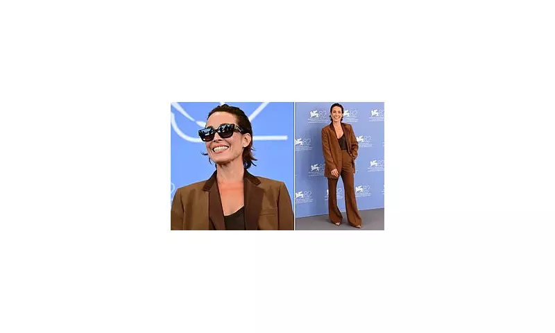 Noomi Rapace Stuns in Flared Brown Suit at Venice Film Festival's 'Mother' Photocall