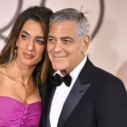 Amal Clooney's Triumphant Return: Human Rights Lawyer Stuns in White at London Premiere