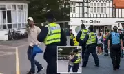 Asylum Seeker Flips Off Protesters Outside UK Migrant Hotel in Defiant Gesture