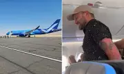 Chaos in the Skies: Drunk Passenger Attacks Flight Attendant with Skateboard and Racial Slurs on LA-Bound Flight