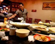 China Slashes Public Sector Pay in Bold Austerity Move to Boost Economy