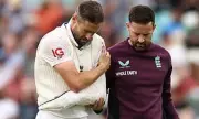 Chris Woakes Bats with One Arm in Gritty Final Stand for England Against India