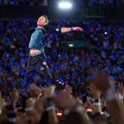 Coldplay's Wembley Spectacle: Chris Martin's Electrifying Performance & Eco-Conscious Concert Redefines Live Music