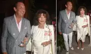 Dame Joan Collins Stuns in White Dress at Glamorous Saint-Tropez Dinner Party with Husband Percy Gibson