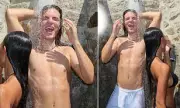 Damian Hurley Flaunts Toned Physique in Steamy Outdoor Shower Snap – Fans Go Wild!