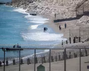 Desperate Migrants Swim from Morocco to Ceuta as Spanish Enclave Struggles with Overcrowding