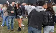 Gary Neville's Rare PDA Moment: Football Pundit Snapped in Passionate Embrace with Wife Emma at Newcastle Festival