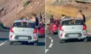Holiday Chaos: Tourists Fined for Perilous Balearic Islands Stunt - Hanging from Moving Cars in Majorca