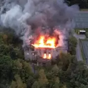 Inferno Engulfs Historic Woolton Hall: Merseyside Fire Crews Battle Overnight Blaze