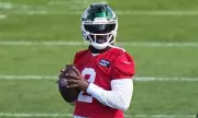 Jets Quarterback Tyrod Taylor Suffers Knee Injury – Team Awaits Crucial Update