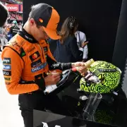 Lando Norris' Trophy Mishap: Champagne Bottle Breaks During Hungary GP Celebrations