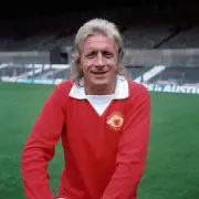 Manchester United Legend Denis Law to Miss Statue Unveiling Due to Health Concerns