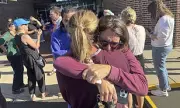 Minneapolis School Shooting: Two Parents Shot Outside Catholic Church Following Child's First Communion