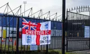 Non-League Club in Turmoil: Furious Fan Storms Dressing Room, Physically Confronts Players