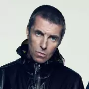 Oasis Pay Heartfelt Tribute to Late Fan During Emotional Reunion Gig