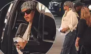 Pregnant Rihanna Flaunts Growing Baby Bump in Stylish White Shirt During Beverly Hills Outing