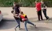 Shocking CCTV: DHL Delivery Driver Unleashes Boxing-Style Attack on Couple in Vicious Parking Row | UK Crime News