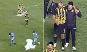 Shocking Moment Footballer Suffers Gruesome Testicular Injury After Being Hit by Firework Mid-Game