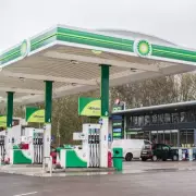 Shocking Moment: Man Brazenly Shoplifts from BP Garage as Staff Watch Helplessly