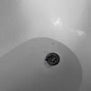 Unblock Your Shower Drain Naturally: 2 Kitchen Staples That Work Wonders