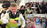 Violence Erupts at London Migrant Hotel Protest: Officer Assaulted as Demonstrators March Through Canary Wharf