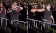 Boston 'Vigil for America' Erupts as Protester Confronts Charlie Kirk with US Flag | Daily Mail