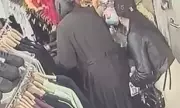 Brazen Phone Thief Caught on Camera Snatching Mobile from Mother's Pocket in UK Shop