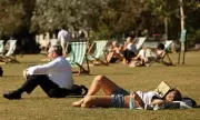 Brits Soak Up Mediterranean Heatwave as UK Braces for September Frost & Rain | Daily Mail