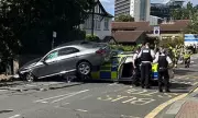 Dramatic Brentford Crash: Mercedes Crashes into Police Car and Shop Front in Late-Night Incident