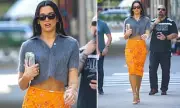 Dua Lipa Turns Heads in NYC with Bold Orange Gucci Skirt and Mohair Crop Top | Daily Mail