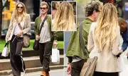 Elle Macpherson's Hair Extension Mishap: Supermodel's Secret Revealed in Awkward Beach Moment