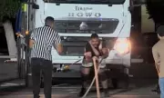 Herculean Feats in Libya: Athletes Compete in Brutal Truck Pulling Championship