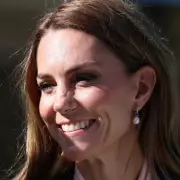 Kate Middleton's Maxi Coat Look: The Princess of Wales Stuns in Regal Emerald at Windsor Engagement