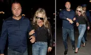 Kate Moss Shrouded in Mystery: Supermodel Clings to Bodyguard Behind Dark Glasses at Paris Fashion Week